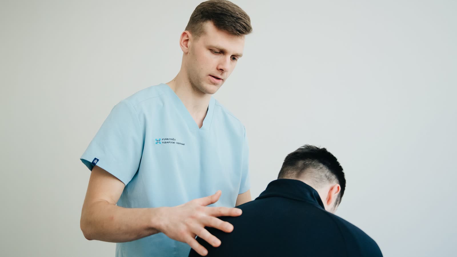 Analyse posturale d'un sportif lors d'un bilan chiropratique